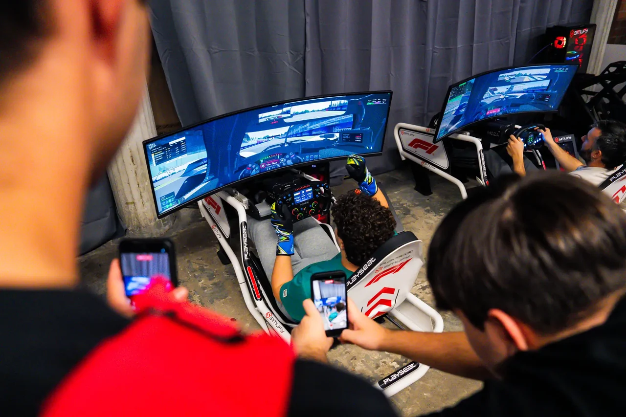 A visitor driving a simulator at the activation